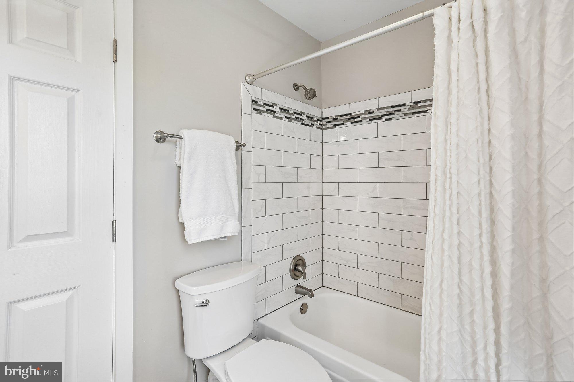 9 Midsummer Court Gaithersburg, MD 20878 - Photo 47 of 69 a bathroom with a toilet and a shower