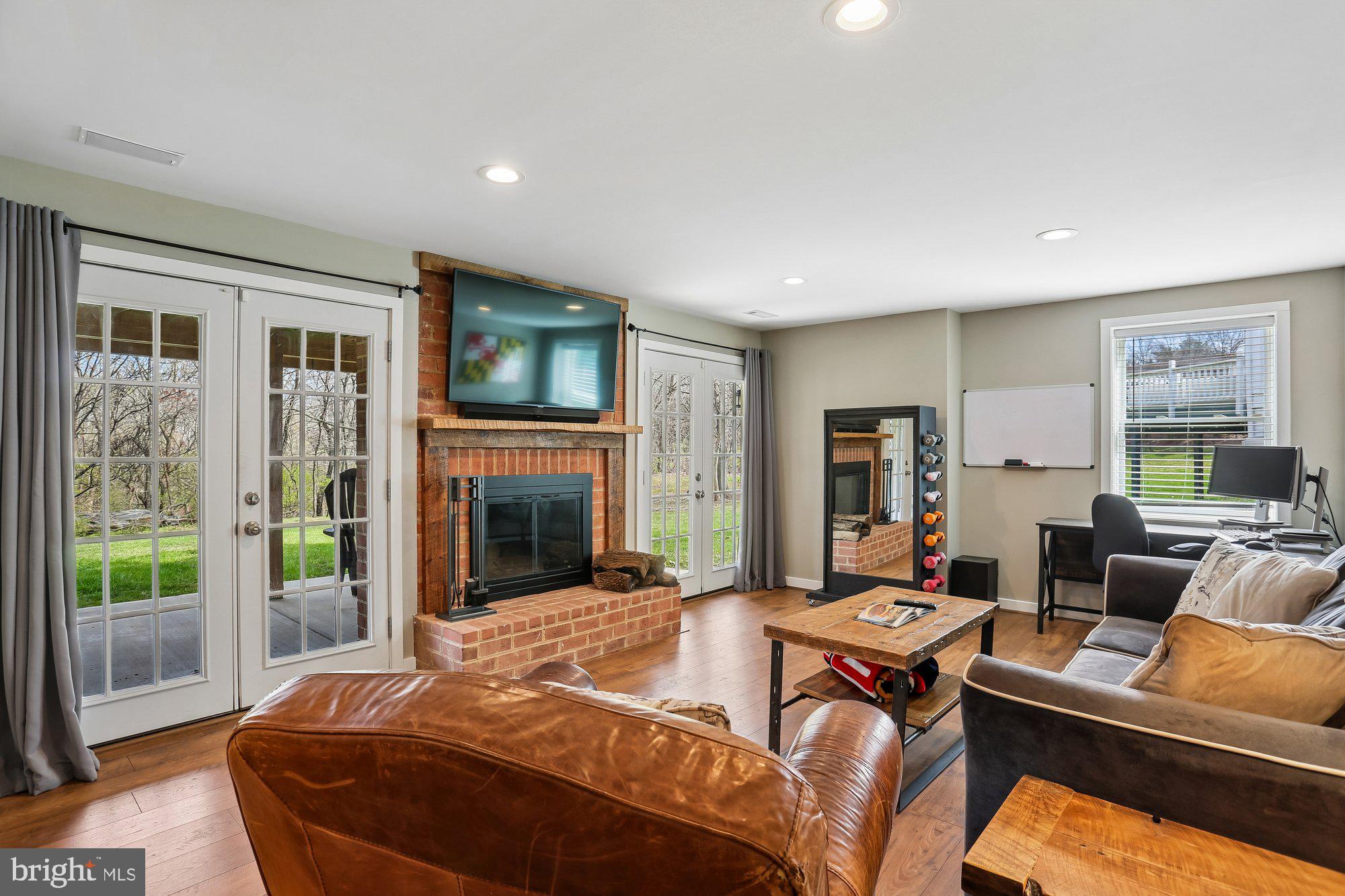 9 Midsummer Court Gaithersburg, MD 20878 - Photo 51 of 69 Recreation room with fireplace