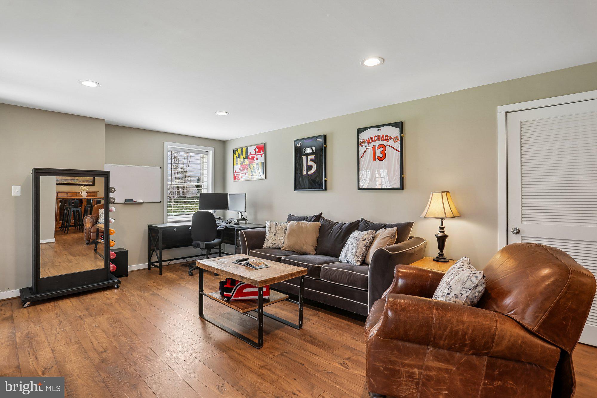 9 Midsummer Court Gaithersburg, MD 20878 - Photo 52 of 69 a living room with furniture and a wooden floor