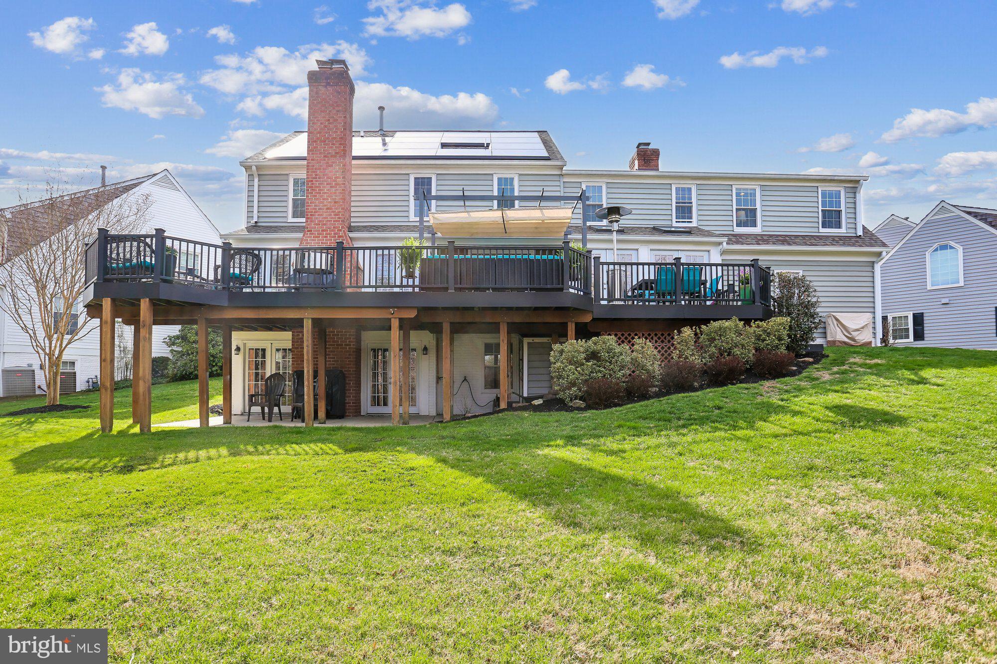 9 Midsummer Court Gaithersburg, MD 20878 - Photo 66 of 69 a view of a big building with a big yard and large trees
