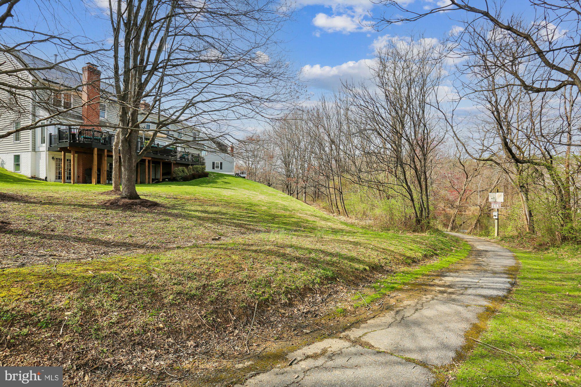 9 Midsummer Court Gaithersburg, MD 20878 - Photo 68 of 69 Yard with pond and walking path views