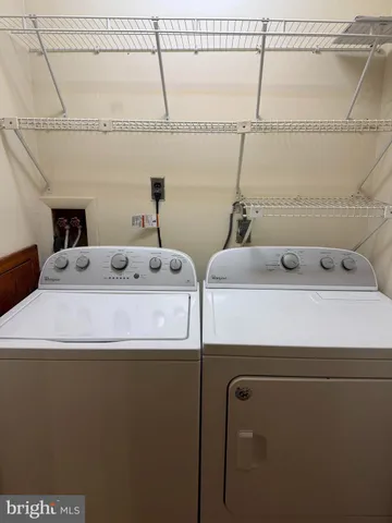 a bathroom with a sink and shower