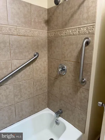 an empty room with wooden floor