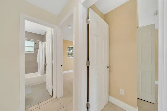 a view of a bathroom with a glass door