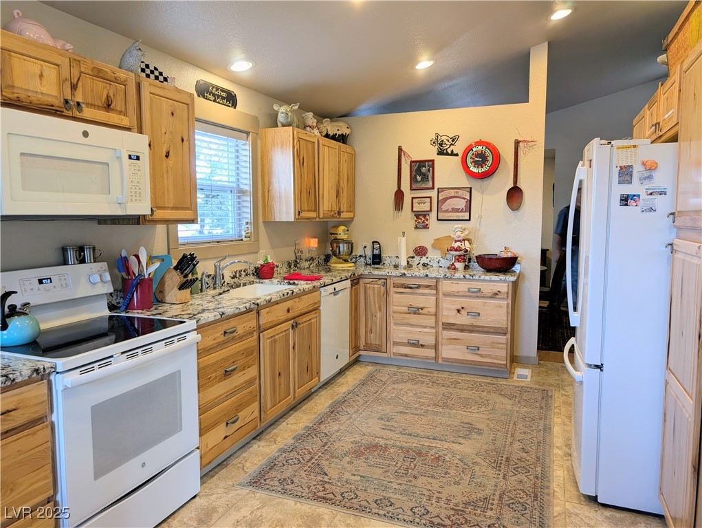 8320 Mother Lode Road Pioche, NV 89043 - Photo 30 of 46 Kitchen featuring granite countertops, hickory cabintry and recessed lighting