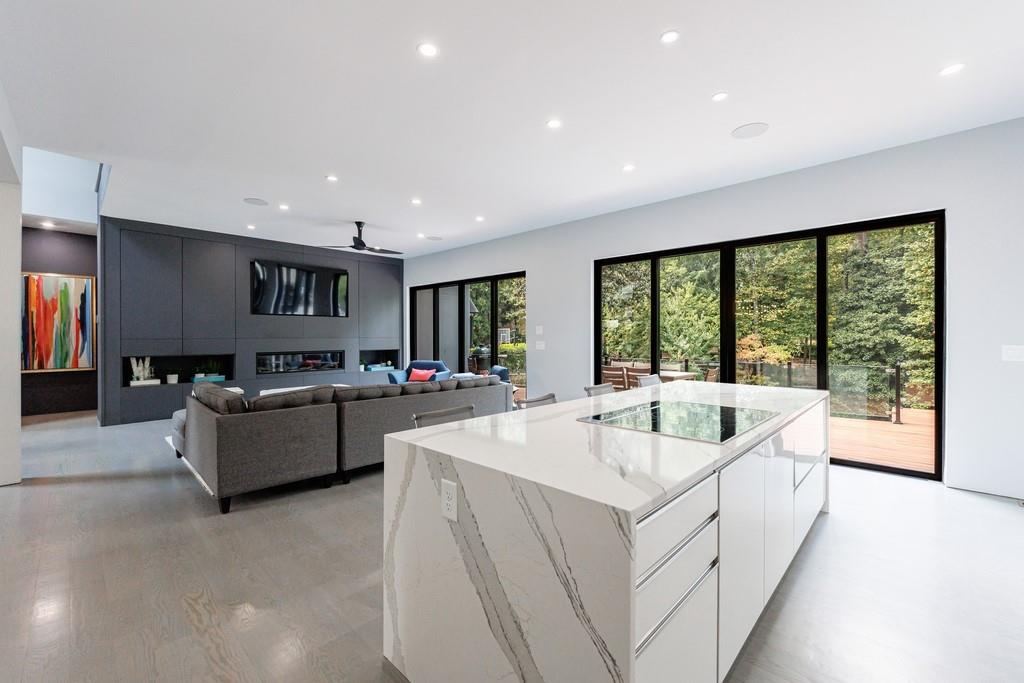 4036 Statewood Road Northeast Atlanta, GA 30342 - Photo 16 of 84 a living room with furniture and a large window