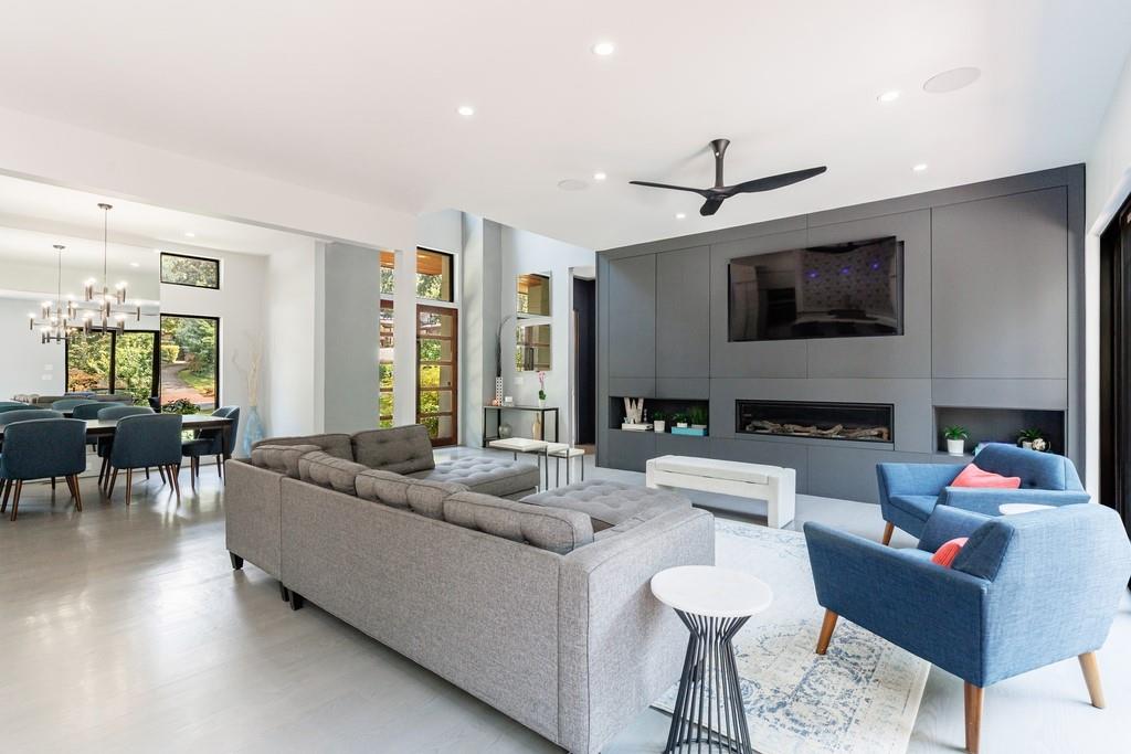 4036 Statewood Road Northeast Atlanta, GA 30342 - Photo 24 of 84 a living room with fireplace furniture and a flat screen tv