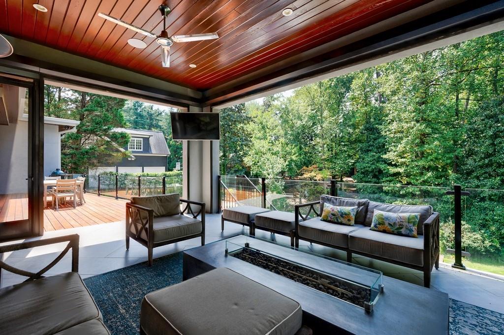 4036 Statewood Road Northeast Atlanta, GA 30342 - Photo 29 of 84 a outdoor living space with furniture and garden view