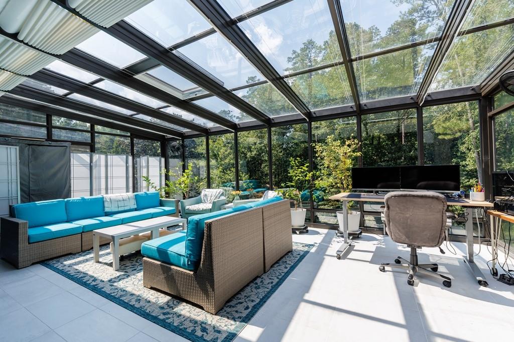 4036 Statewood Road Northeast Atlanta, GA 30342 - Photo 49 of 84 a living room with furniture and a fireplace