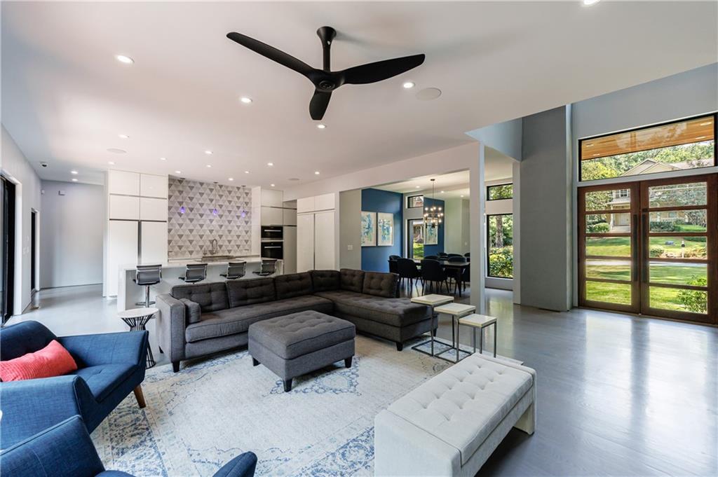 4036 Statewood Road Northeast Atlanta, GA 30342 - Photo 5 of 84 a living room with furniture and a large window