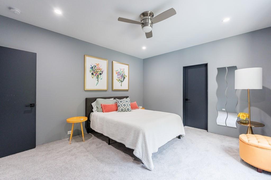 4036 Statewood Road Northeast Atlanta, GA 30342 - Photo 61 of 84 a bedroom with a bed and furniture