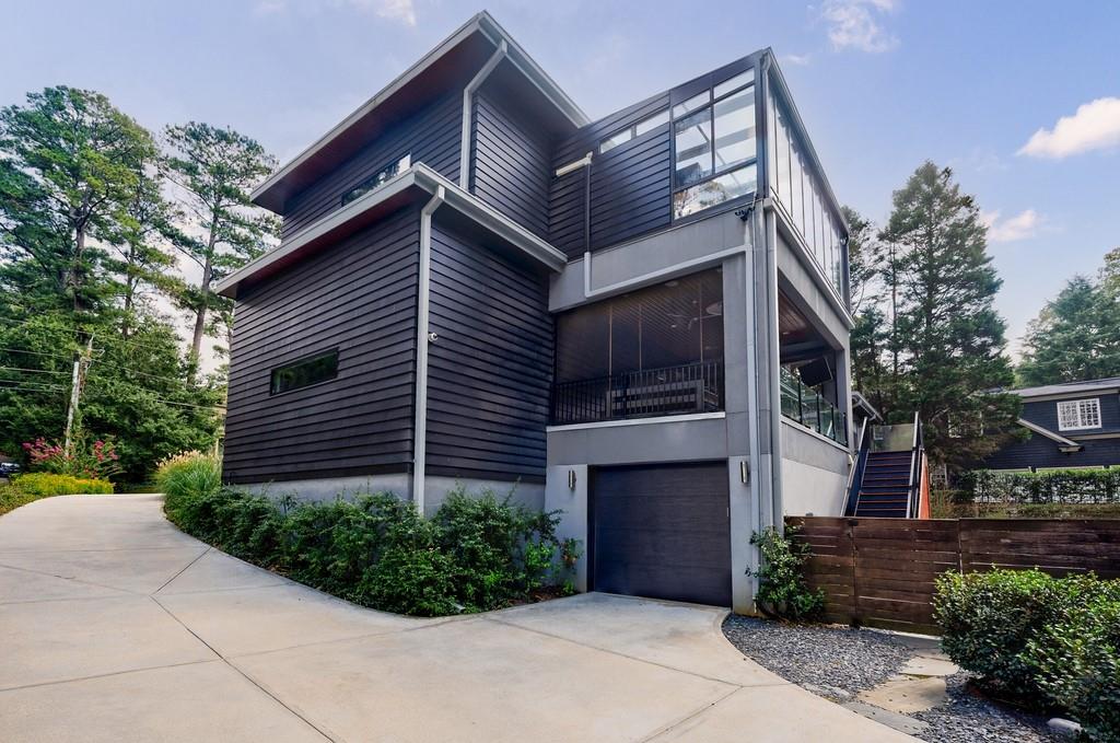 4036 Statewood Road Northeast Atlanta, GA 30342 - Photo 79 of 84 a view of a house with a yard and potted plants