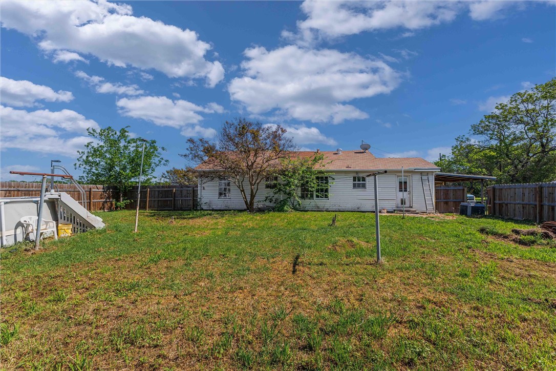 3840 Parrish Street Waco, TX 76705 - Photo 16 of 17 a view of a house with backyard and trees
