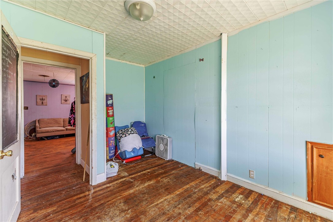 3840 Parrish Street Waco, TX 76705 - Photo 10 of 17 a view of a bedroom with baby bed