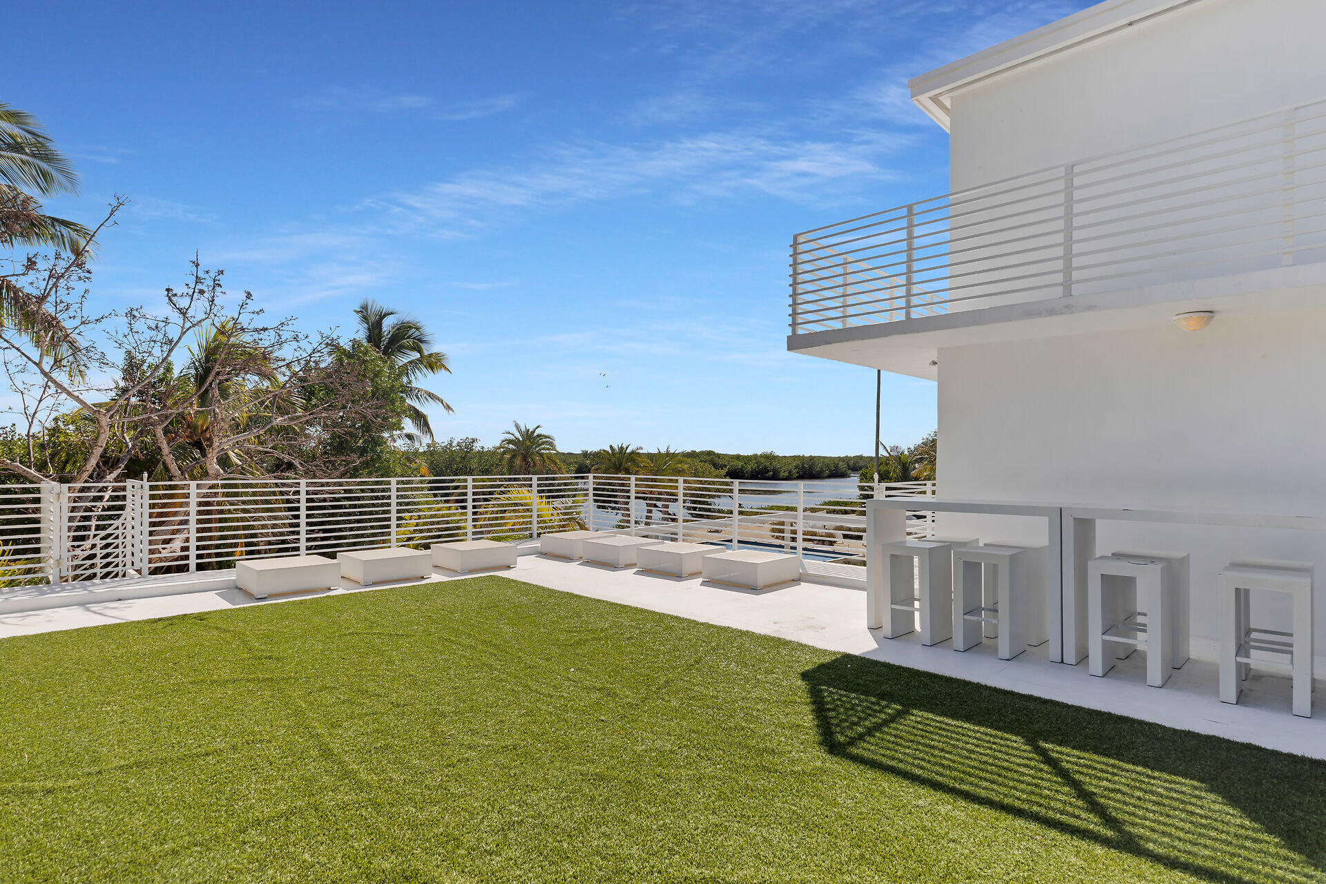 98701 Overseas Highway Key Largo, FL 33037 - Photo 21 of 47 a swimming pool with outdoor seating and yard