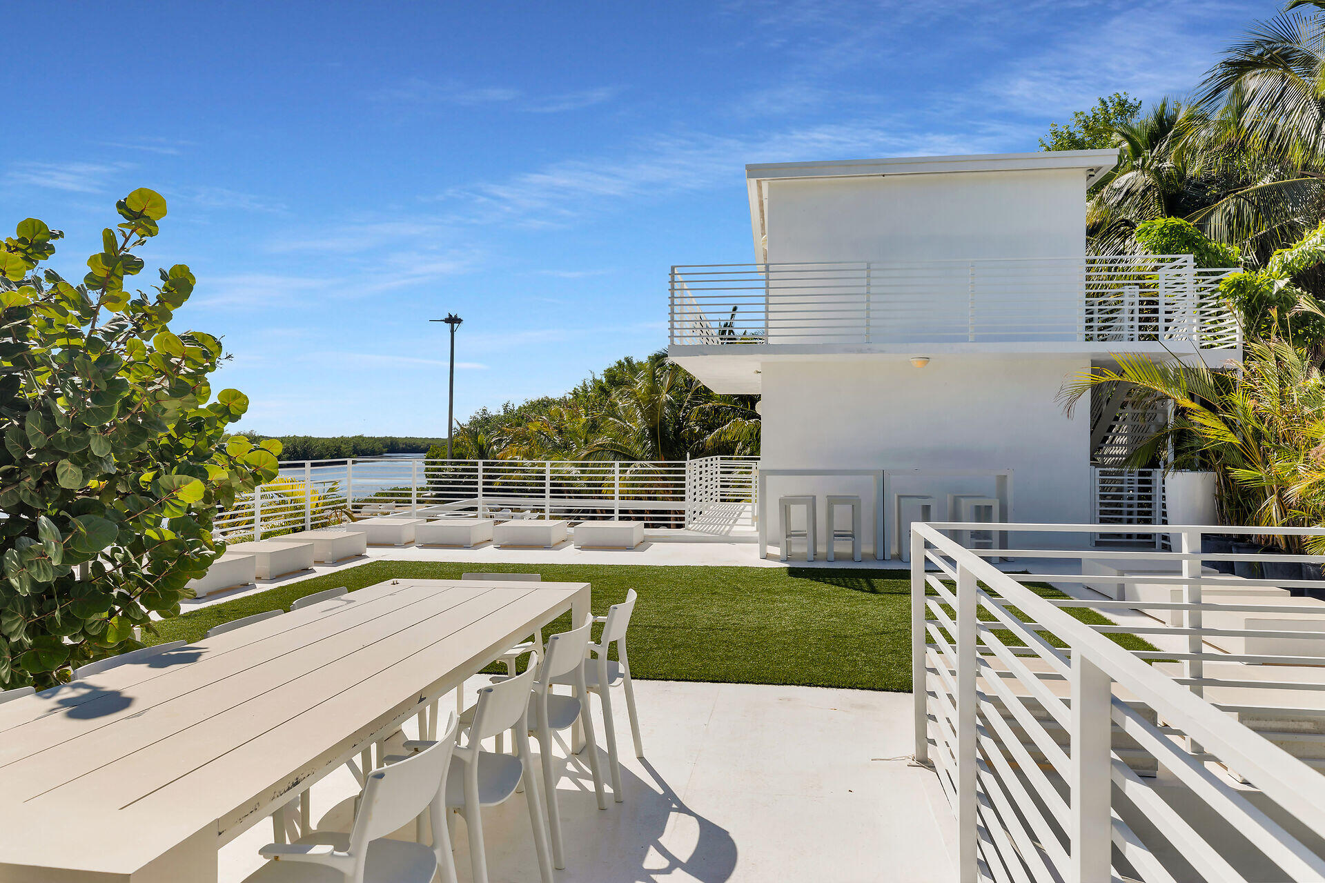 98701 Overseas Highway Key Largo, FL 33037 - Photo 22 of 47 a view of a swimming pool with a patio