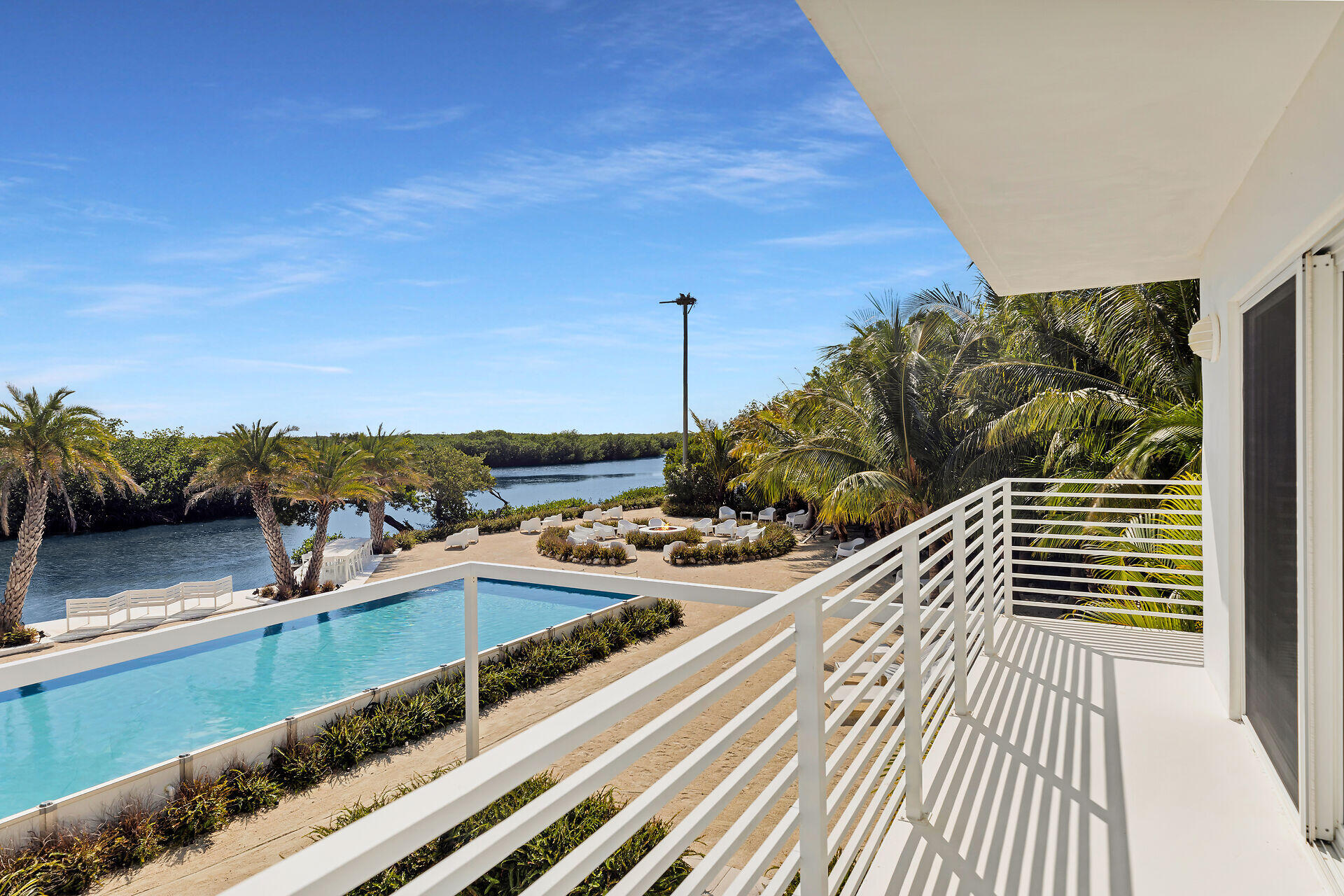 98701 Overseas Highway Key Largo, FL 33037 - Photo 23 of 47 a view of a balcony with chairs