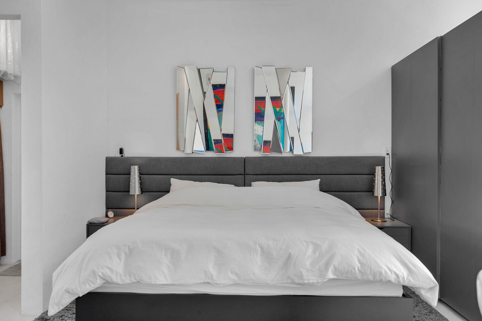 98701 Overseas Highway Key Largo, FL 33037 - Photo 38 of 47 a bedroom with a bed and cabinet