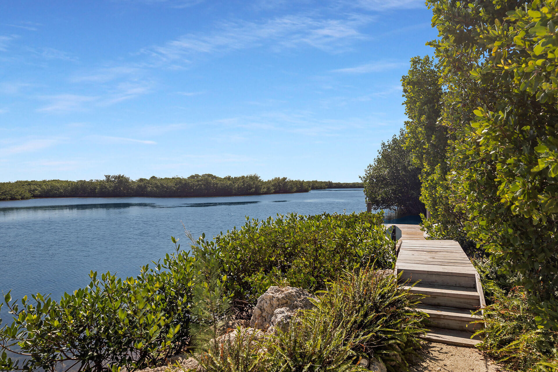 98701 Overseas Highway Key Largo, FL 33037 - Photo 9 of 47 a view of a lake with a city