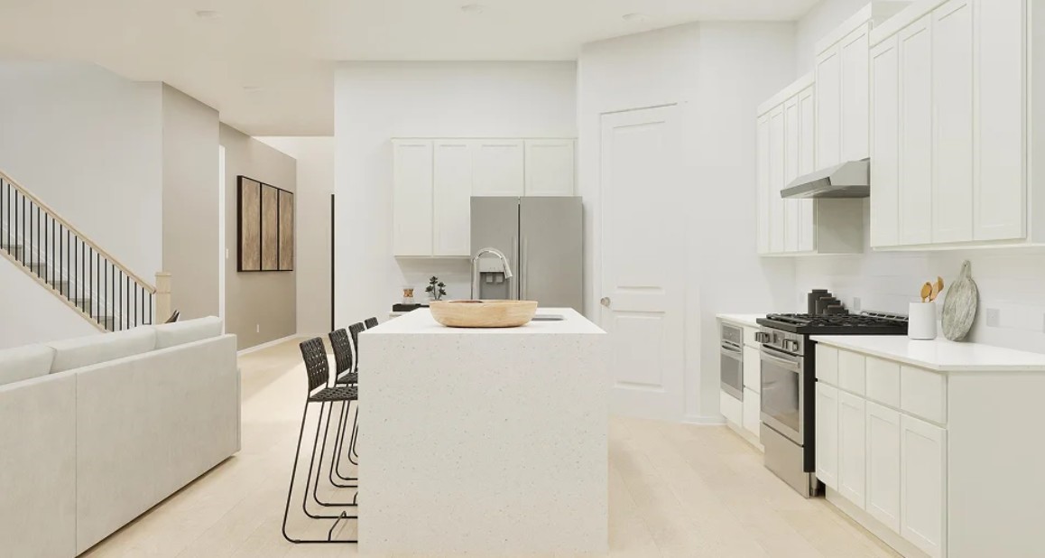 2707 Grove Crest Drive Rosenberg, TX 77469 - Photo 9 of 10 a kitchen with a sink appliances and cabinets