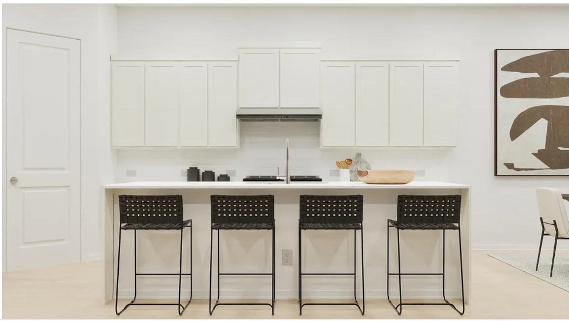 2707 Grove Crest Drive Rosenberg, TX 77469 - Photo 10 of 10 a kitchen with stainless steel appliances cabinets and a table