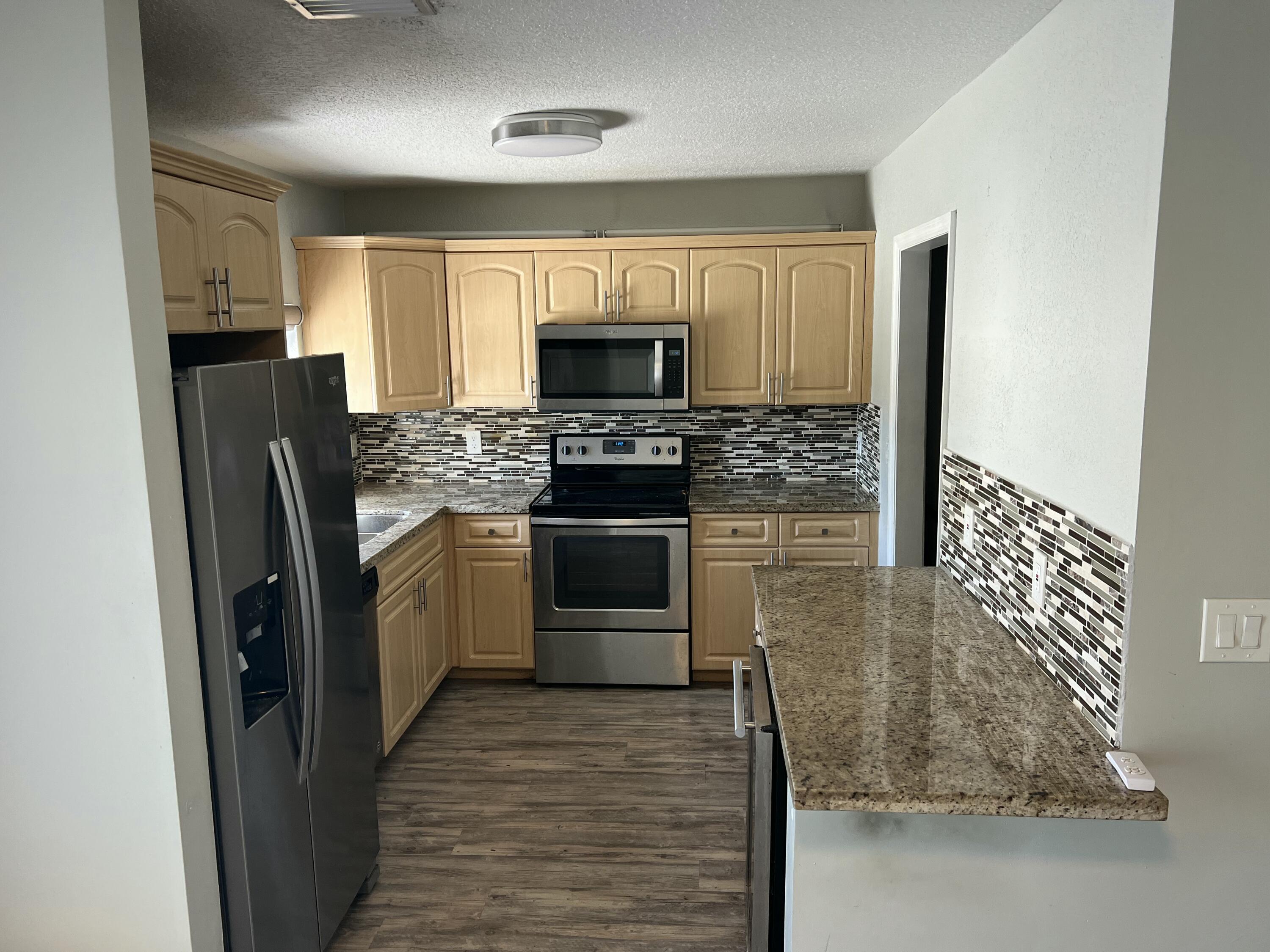 516 Northwest 54th Street Boca Raton, FL 33487 - Photo 5 of 17 IMG_2361