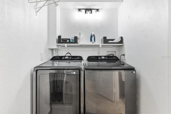 a close view of sink and cabinets