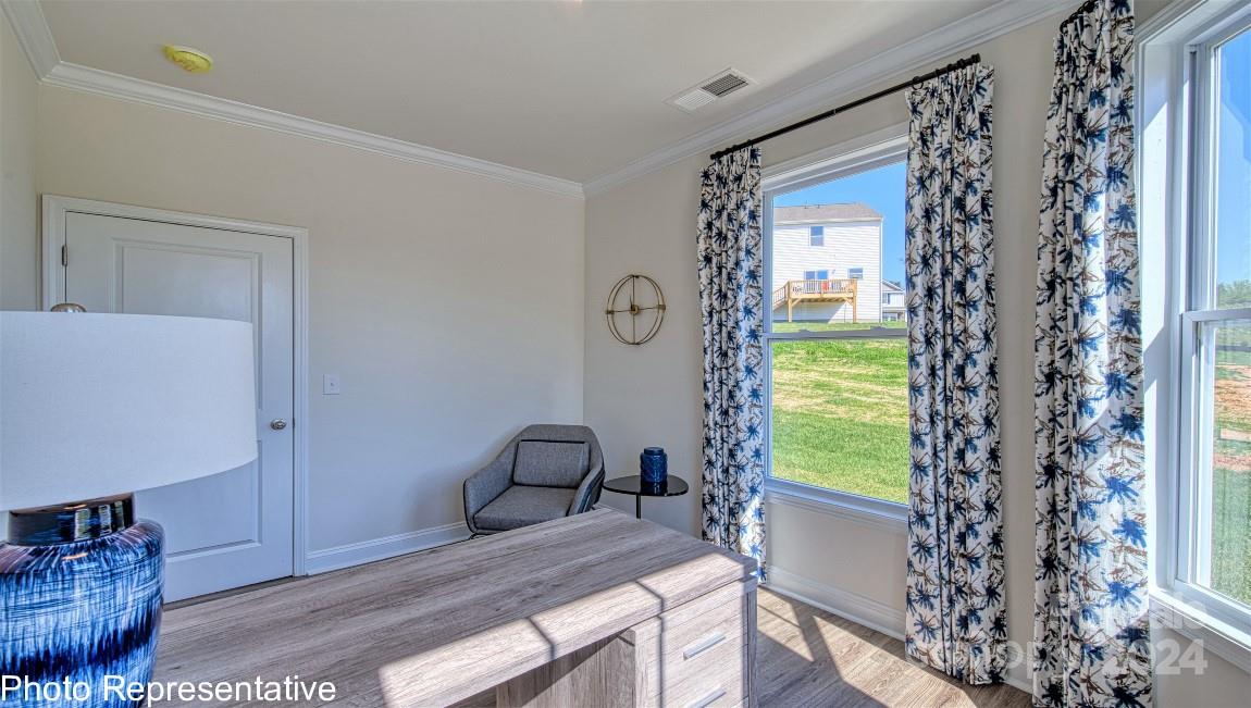 448 Wheatfield Road Fletcher, NC 28732 - Photo 23 of 47 a bedroom with a bed and a window