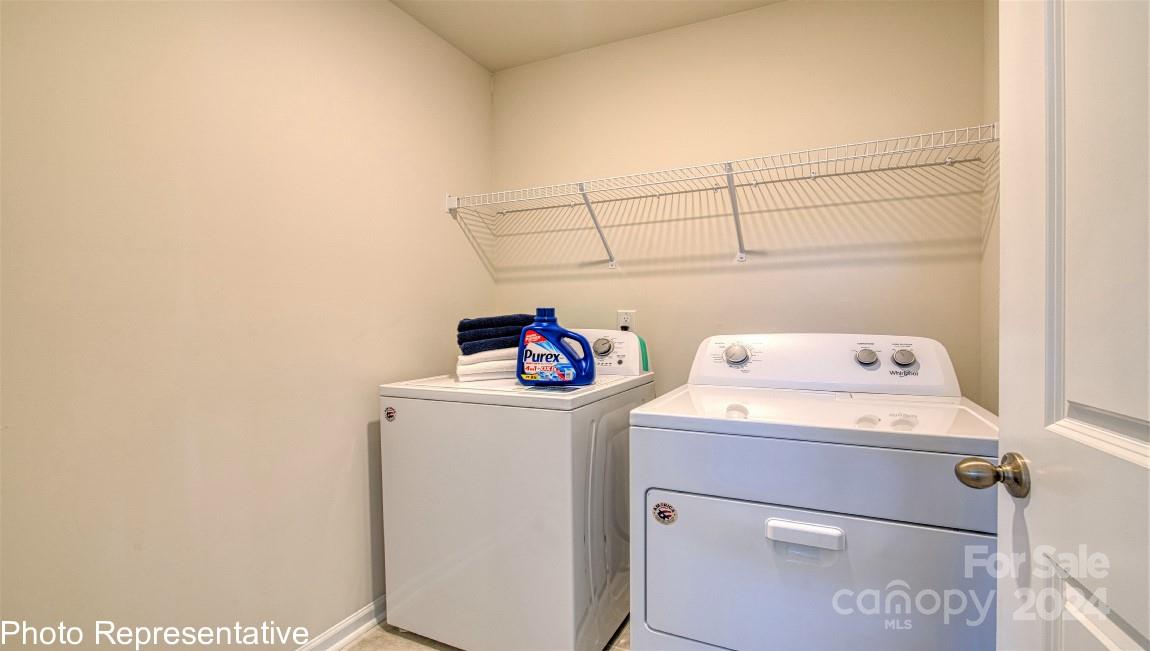 448 Wheatfield Road Fletcher, NC 28732 - Photo 30 of 47 a utility room with dryer and washer