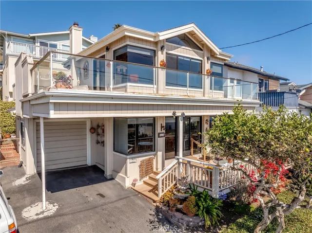 a front view of a house with a porch