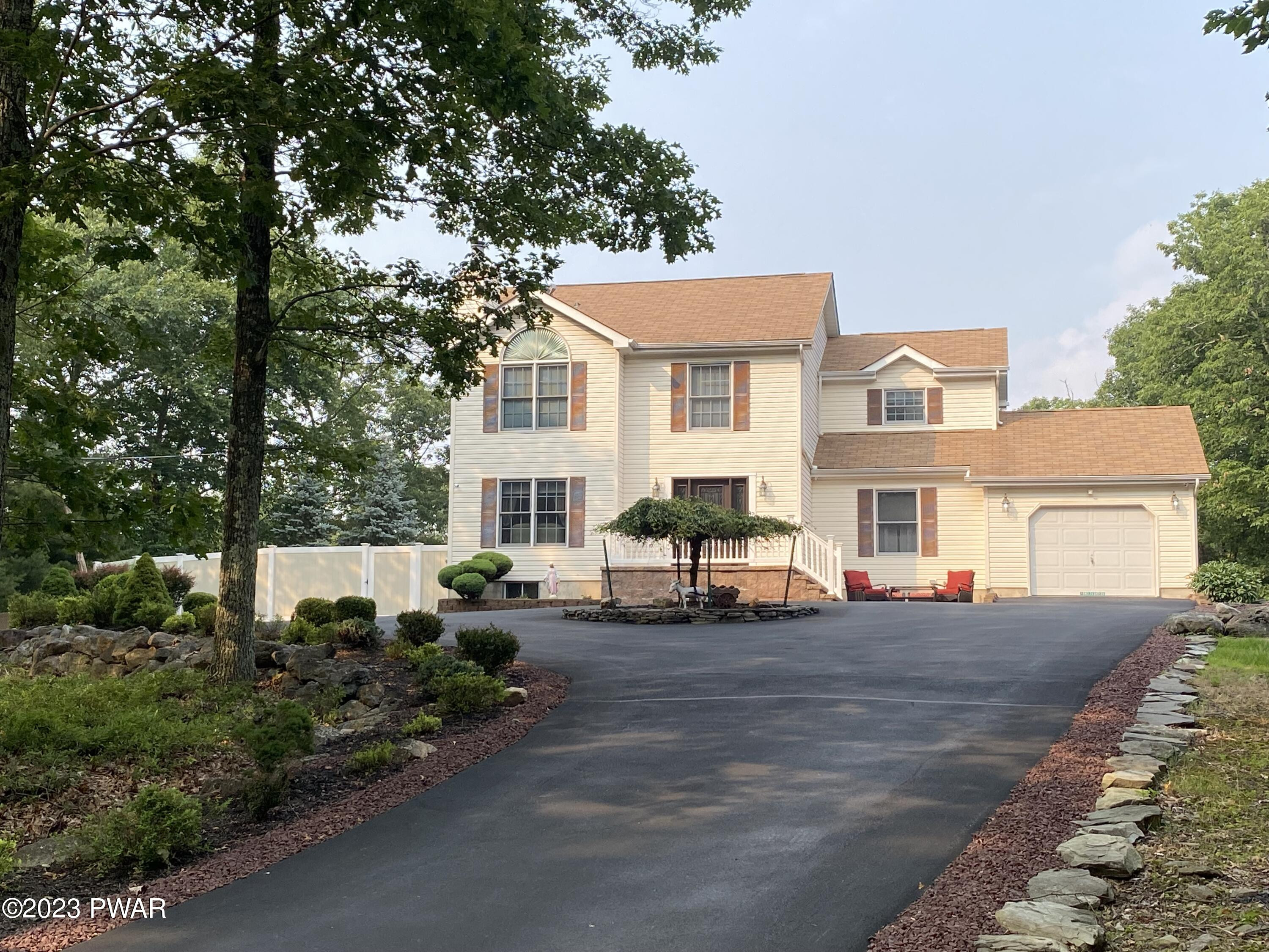 126 Maple Ridge Road Milford, PA 18337 - Photo 1 of 52 a view of a house with outdoor space and street view