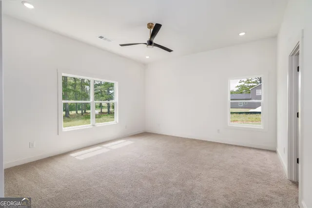 a bathroom with a bathtub sink and toilet