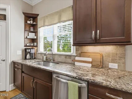 a bathroom with a sink a vanity and a mirror
