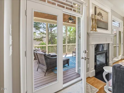 a bathroom with a shower curtain and a sink