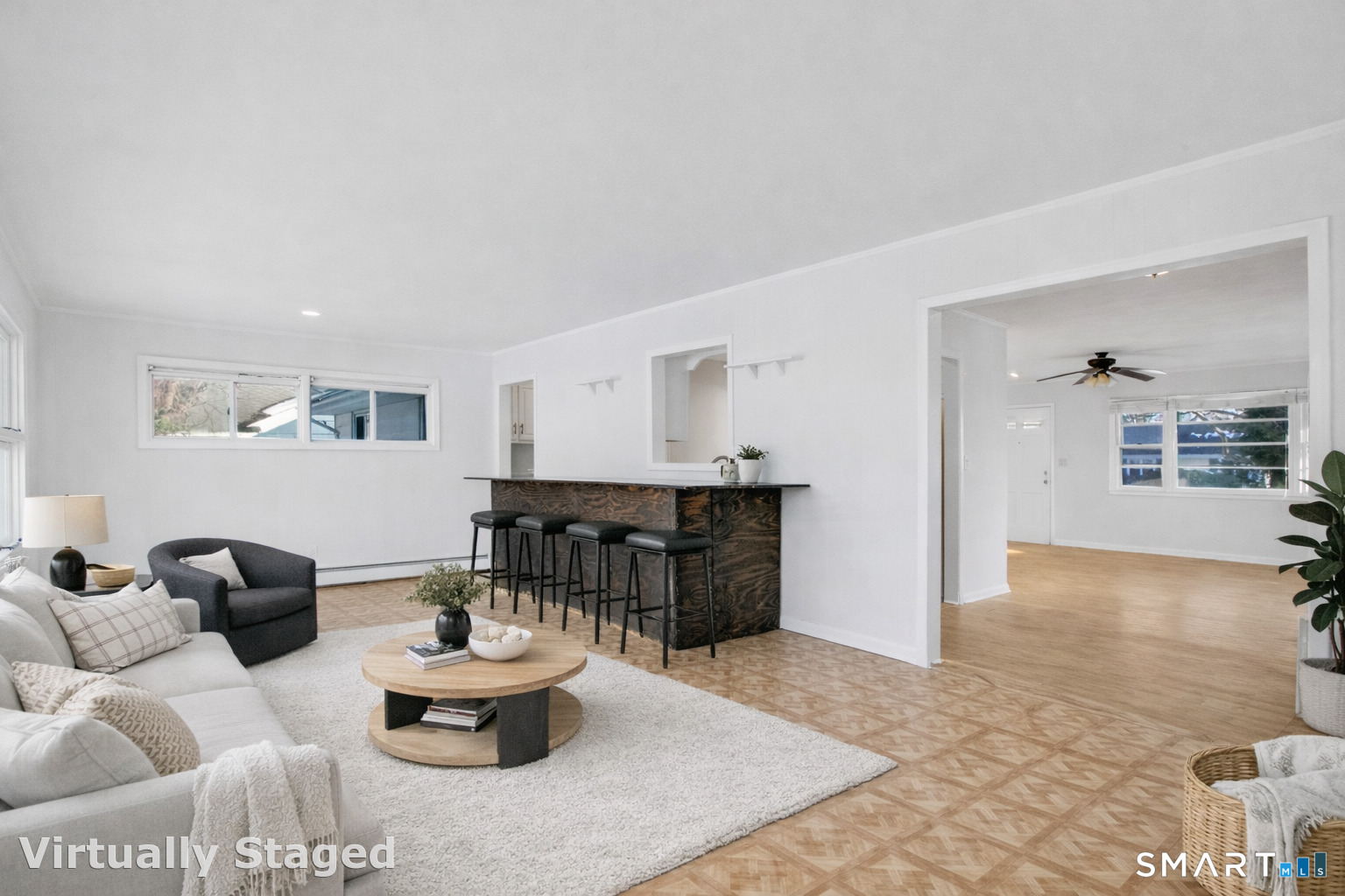 3432 Old Town Road Bridgeport, CT 06606 - Photo 27 of 27 a living room with furniture and a wooden floor