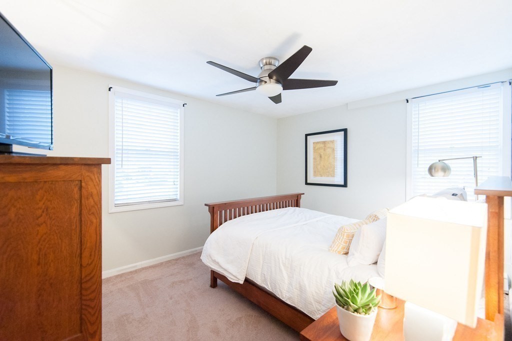 224 West Sixth Street, Unit 2 Boston, MA 02127 - Photo 14 of 18 a bedroom with a bed and a window