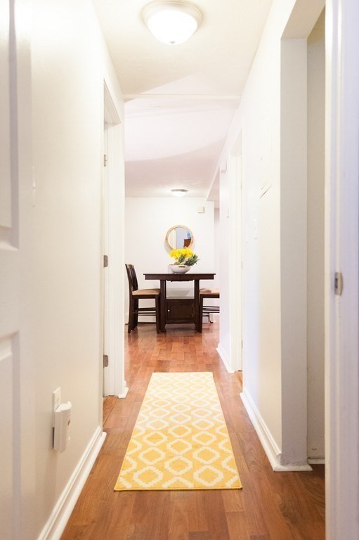 224 West Sixth Street, Unit 2 Boston, MA 02127 - Photo 17 of 18 a living room with furniture and next to a window