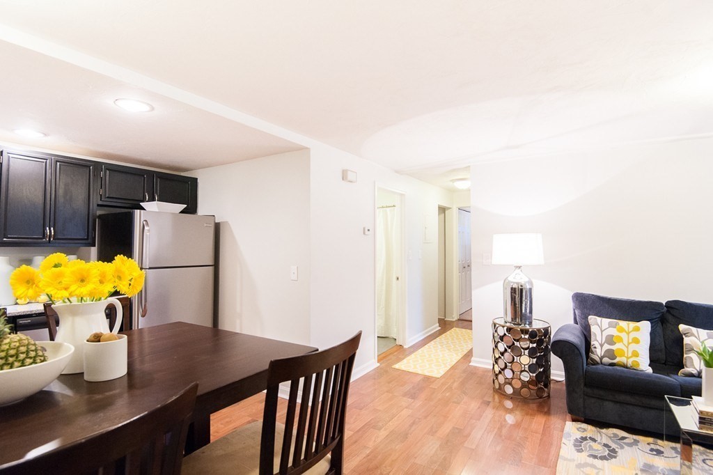 224 West Sixth Street, Unit 2 Boston, MA 02127 - Photo 3 of 18 a dining room with furniture and wooden floor