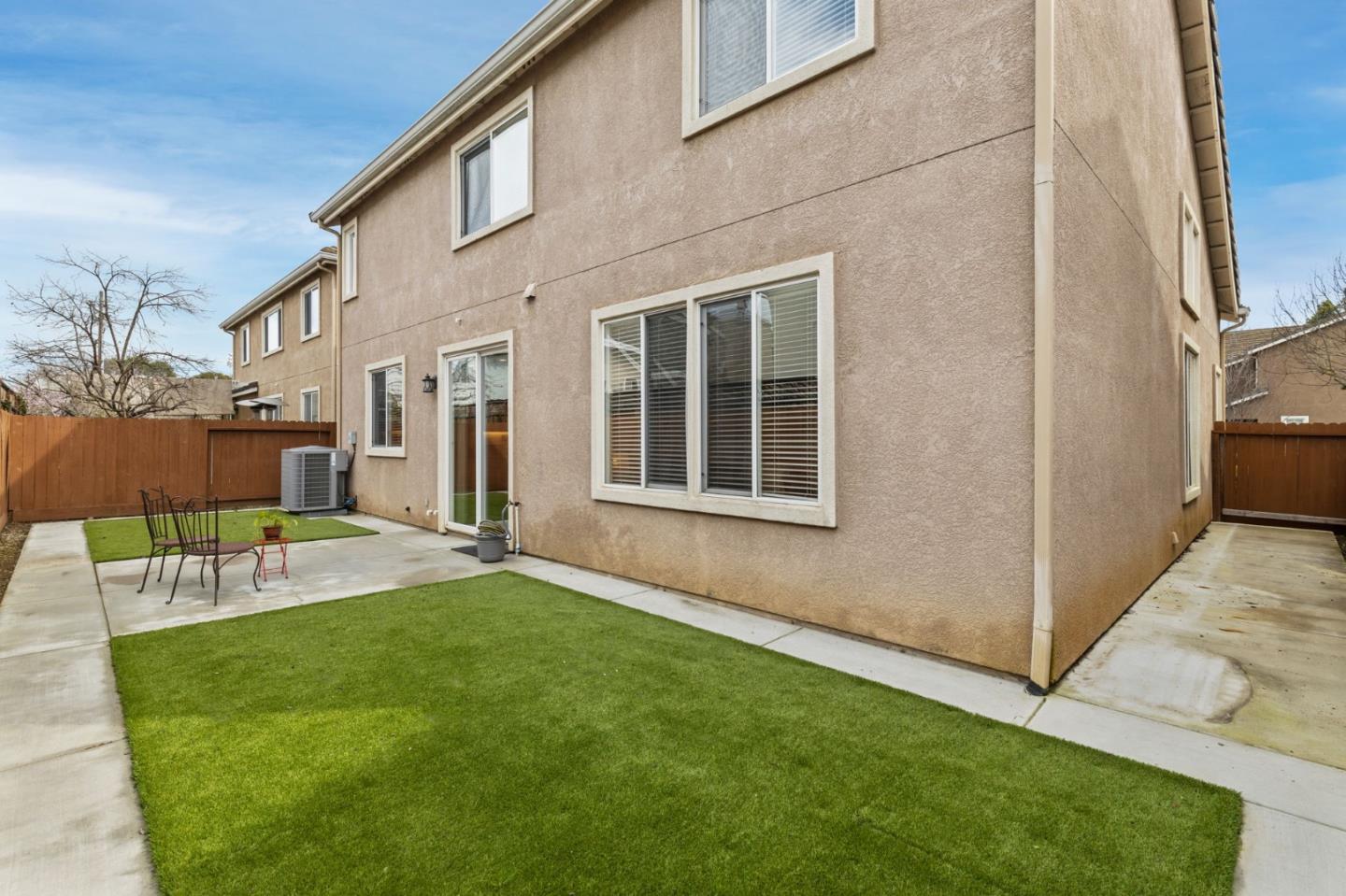 8975 Del Rio Circle Gilroy, CA 95020 - Photo 24 of 24 a view of a house with backyard and sitting area