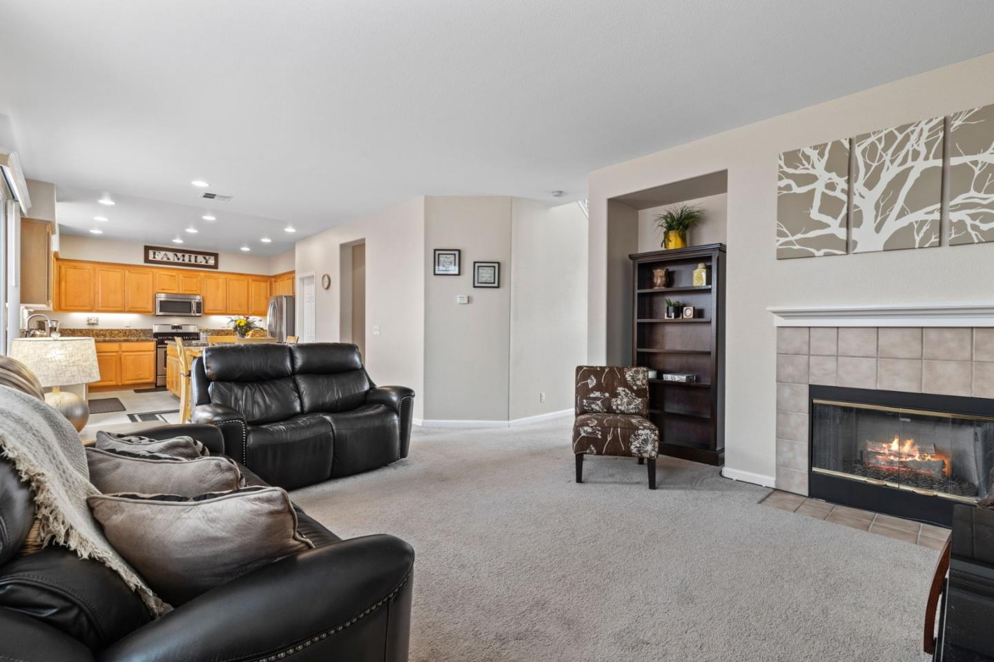 8975 Del Rio Circle Gilroy, CA 95020 - Photo 6 of 24 a living room with furniture and a fireplace