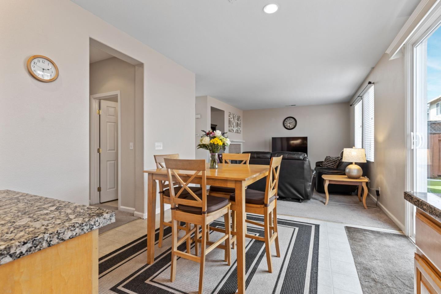 8975 Del Rio Circle Gilroy, CA 95020 - Photo 10 of 24 a view of a dining room with furniture