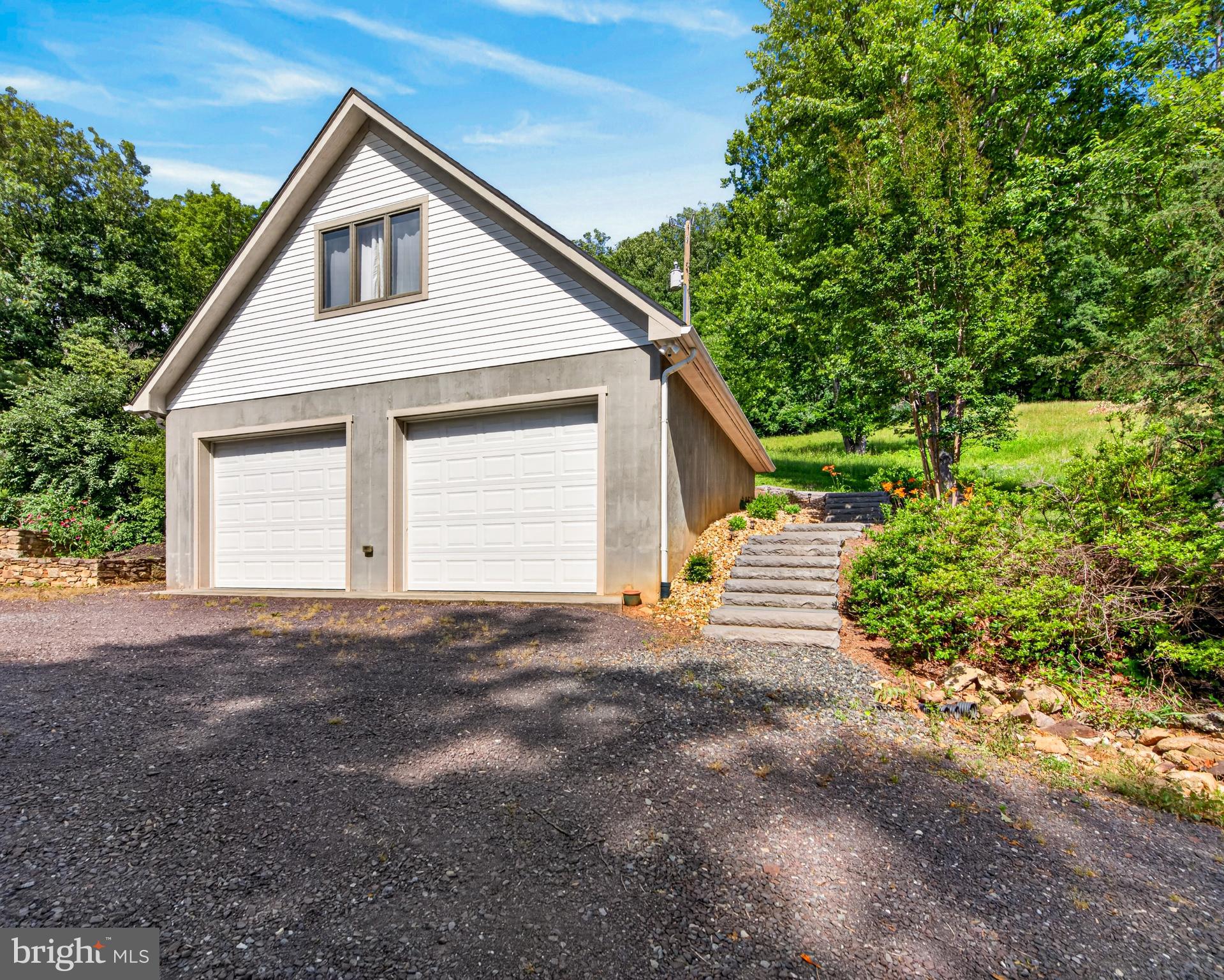 4028 South F T Valley Road Etlan, VA 22719 - Photo 95 of 101 a view of a house with a yard and garage