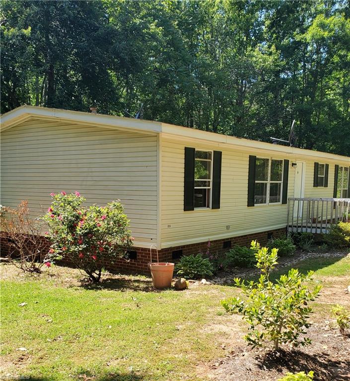 502 Shaw Road Elon, NC 27244 - Photo 12 of 15 Left side of house