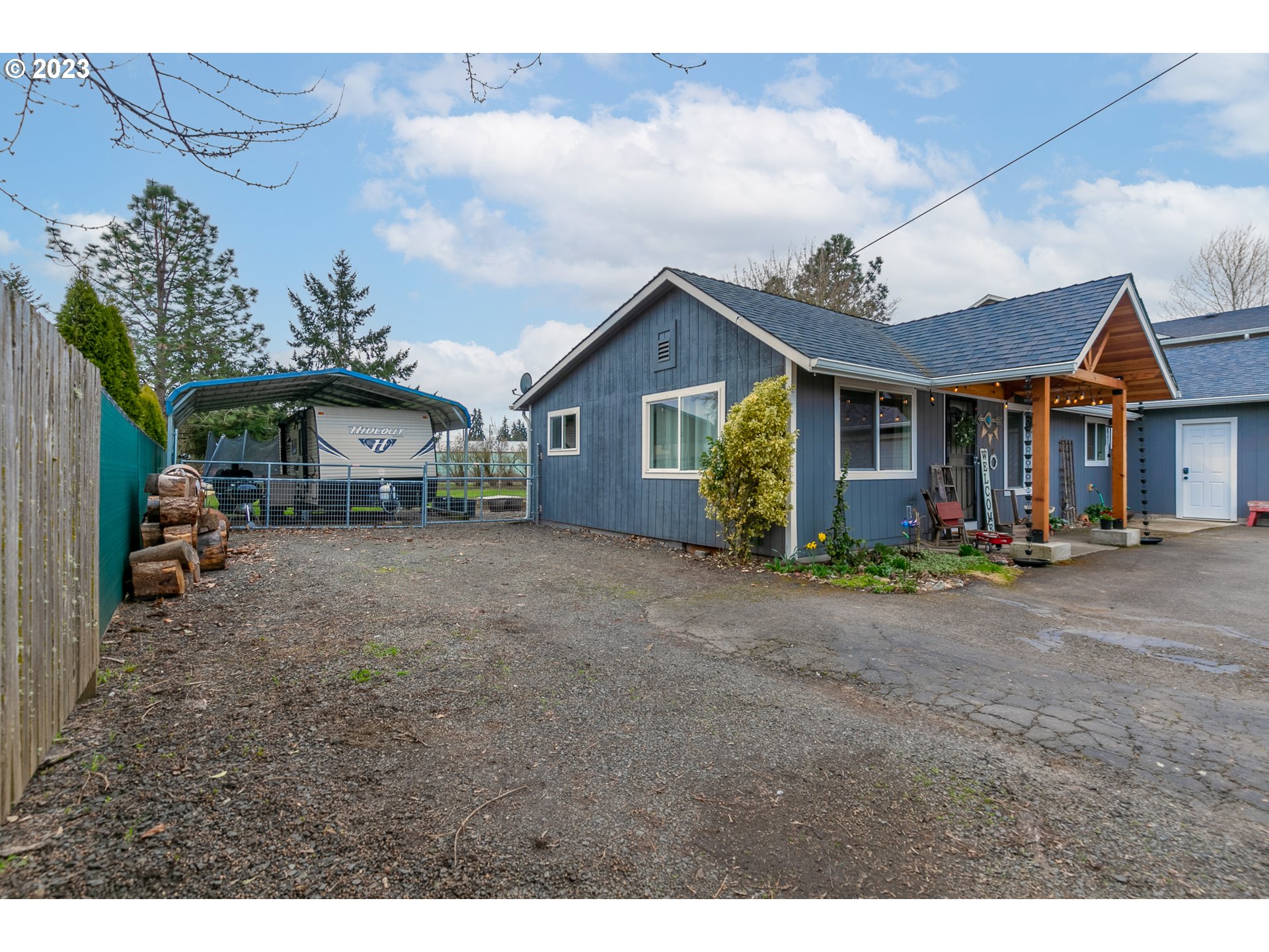 438 West Mary Street Lebanon, OR 97355 - Photo 25 of 33 a front view of a house with a garden