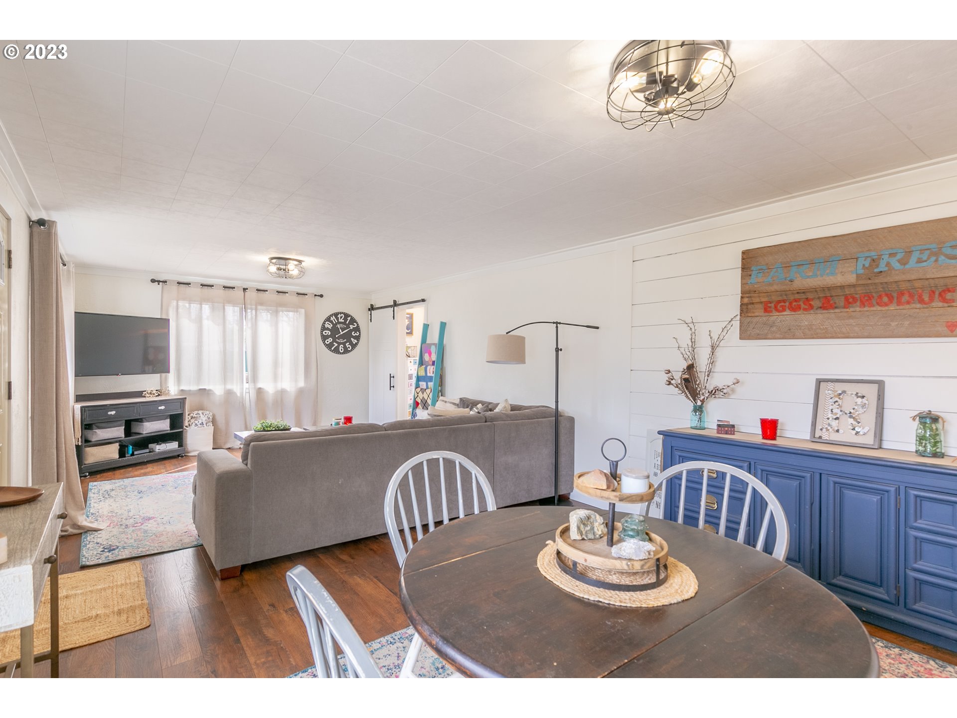 438 West Mary Street Lebanon, OR 97355 - Photo 6 of 33 a living room with furniture and wooden floor