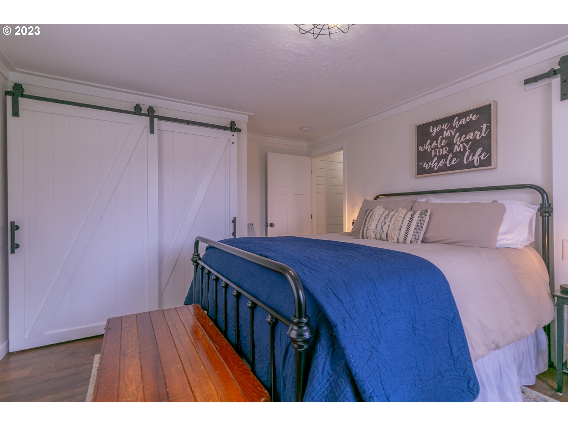 438 West Mary Street Lebanon, OR 97355 - Photo 10 of 33 a bedroom with a bed and a table