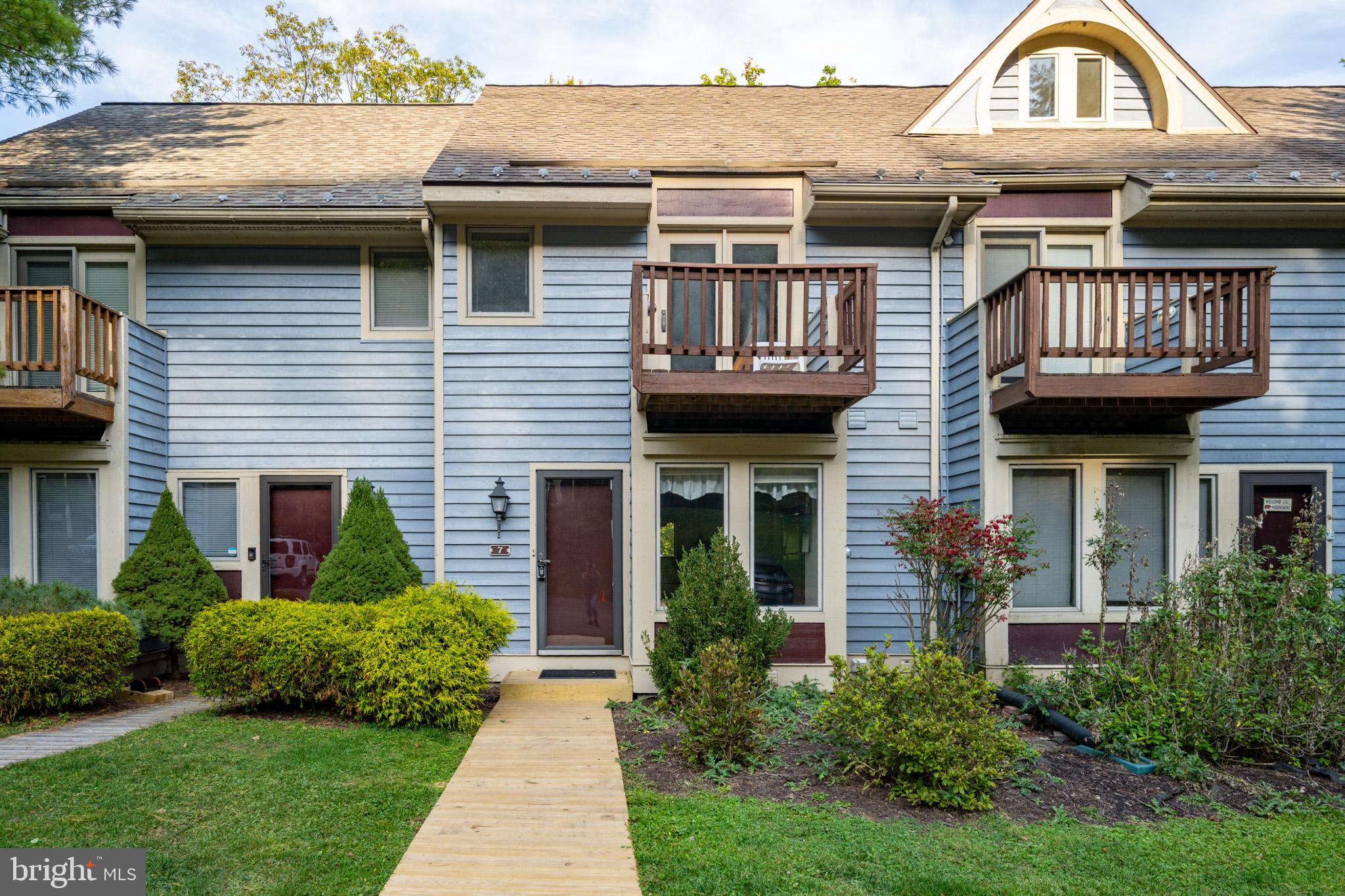 a view of a house with a garden