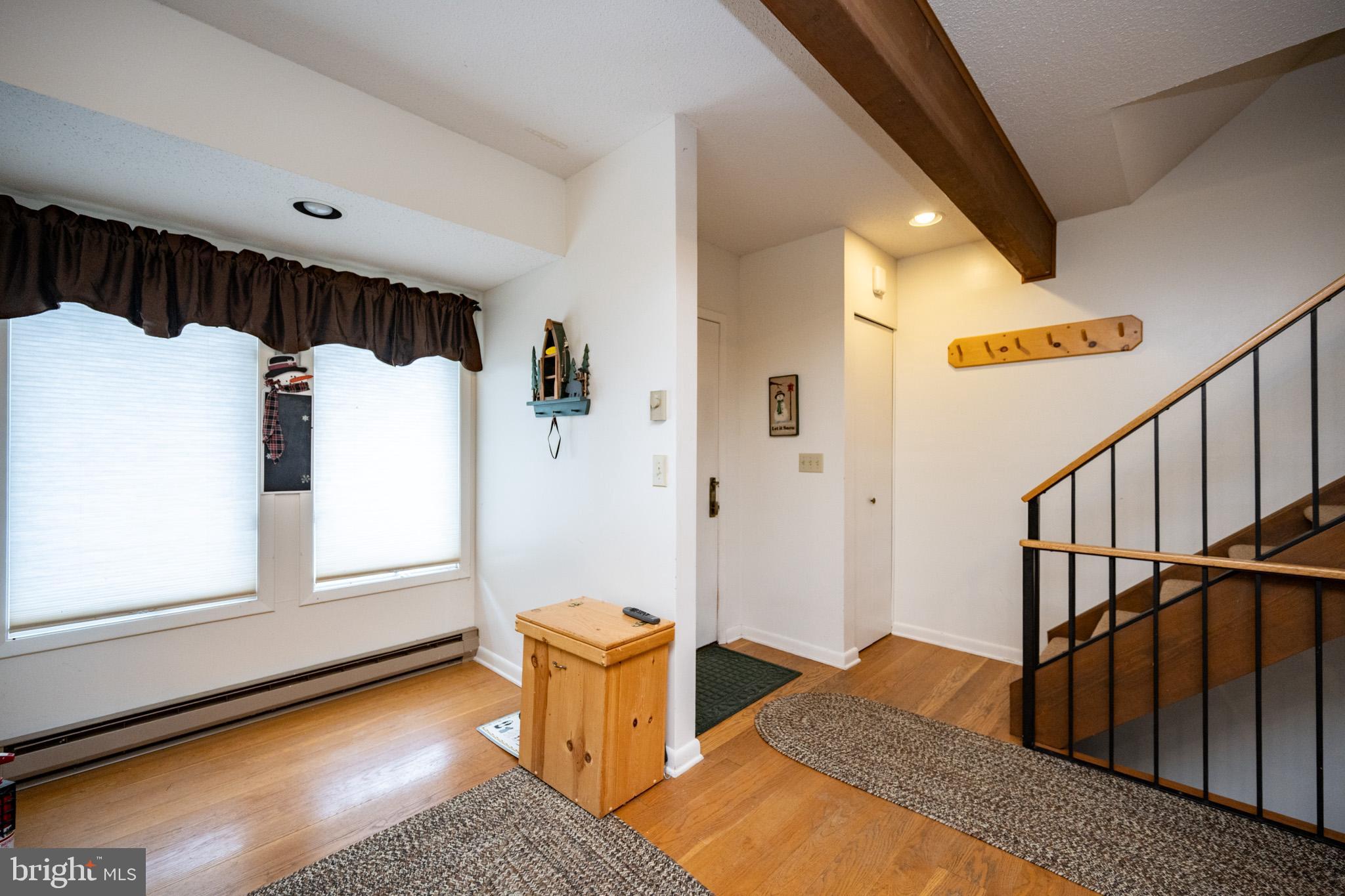 7 Winding Way, Unit 12B McHenry, MD 21541 - Photo 13 of 44 a bedroom with furniture and a window