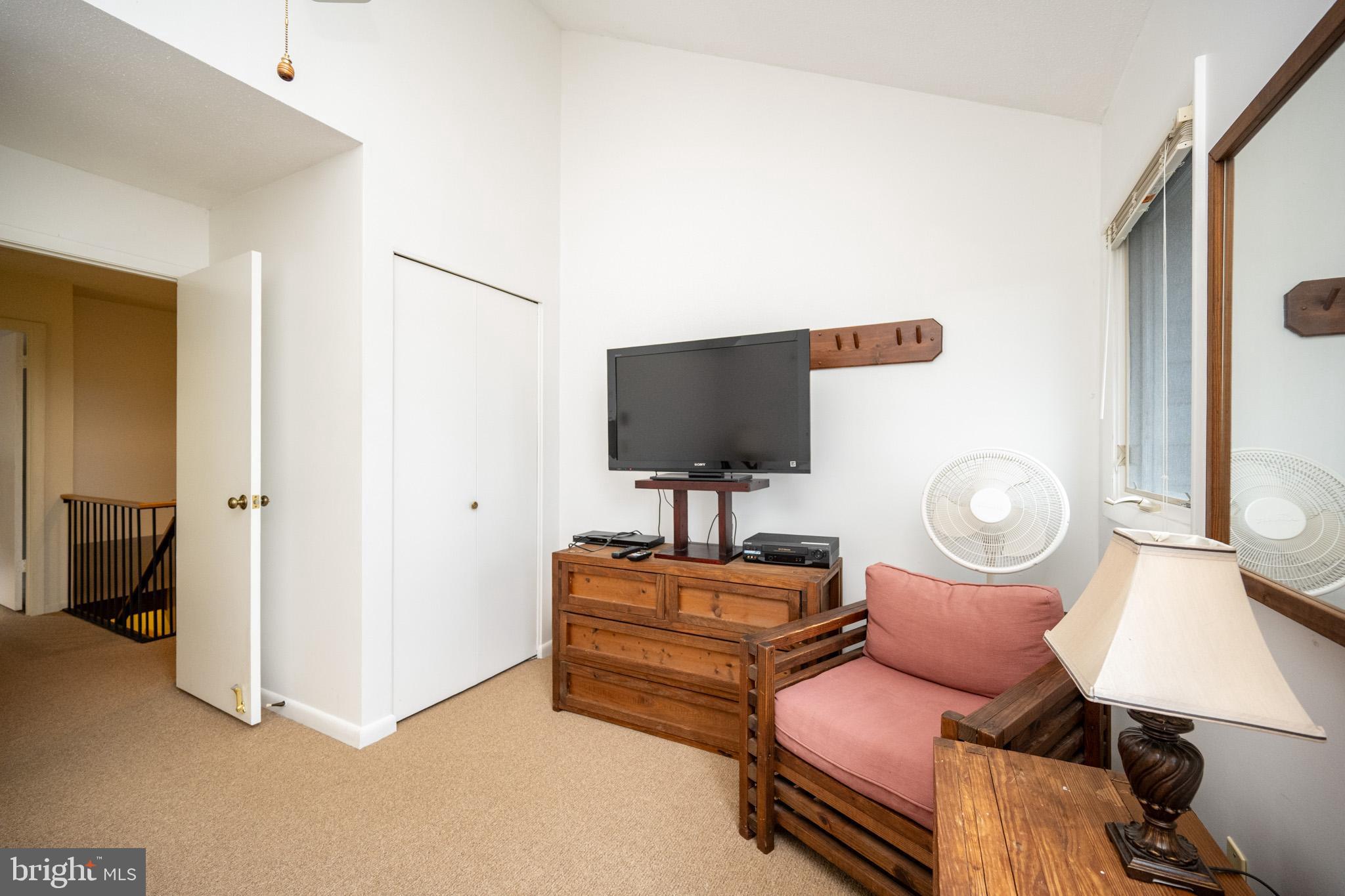 7 Winding Way, Unit 12B McHenry, MD 21541 - Photo 19 of 44 a living room with furniture and a flat screen tv
