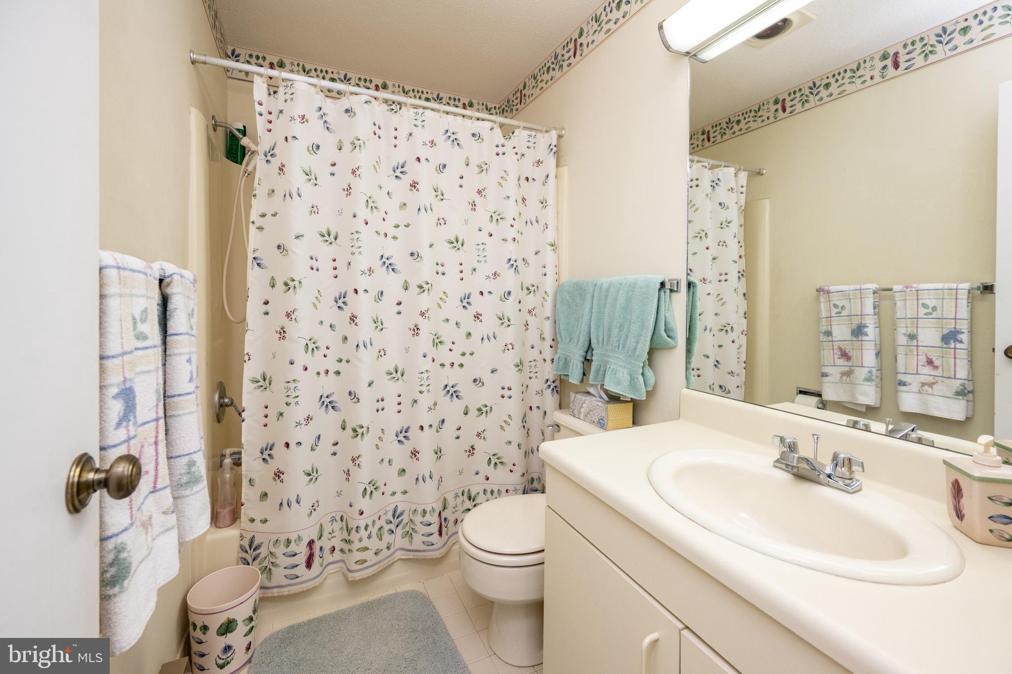 7 Winding Way, Unit 12B McHenry, MD 21541 - Photo 22 of 44 a bathroom with a sink toilet and shower